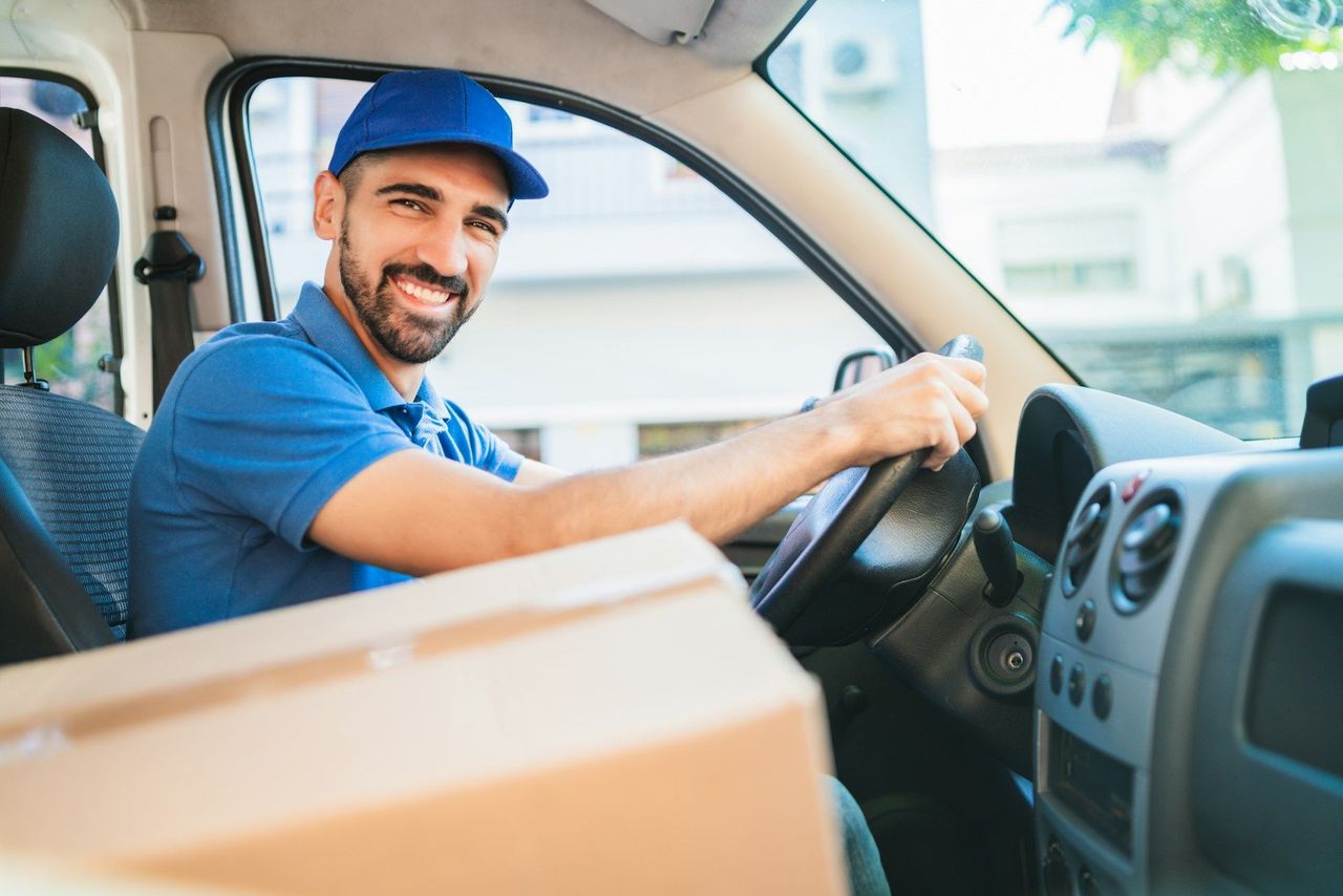 Delivery driver with packages