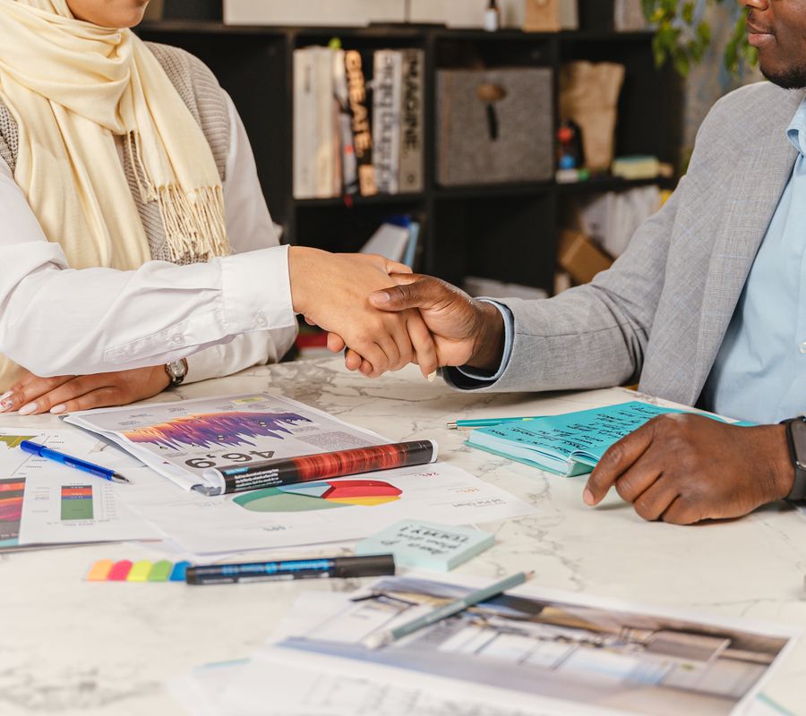 Business handshake over a contract
