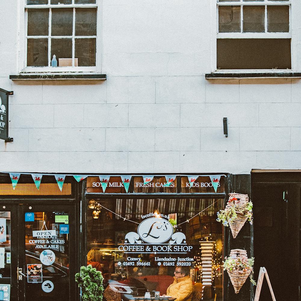 Small business storefronts on a busy street