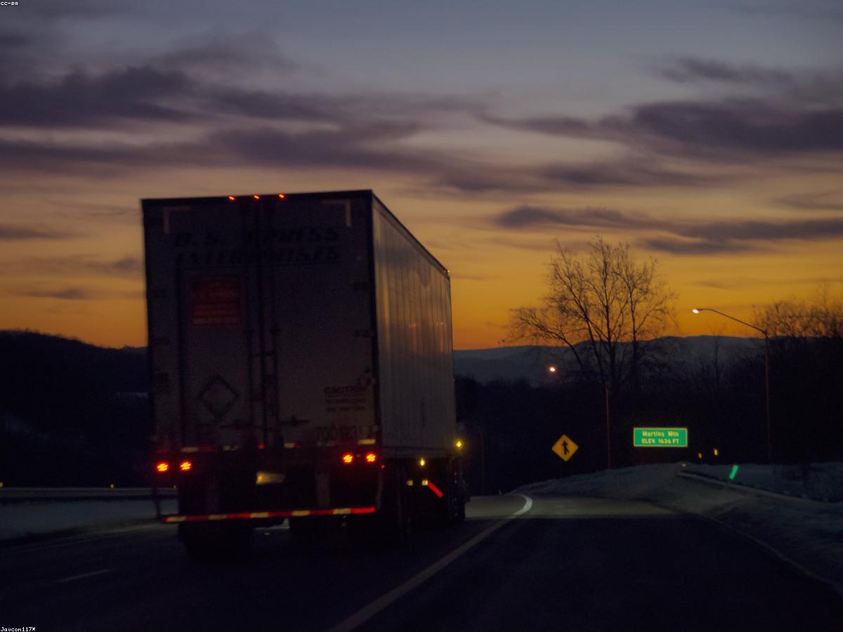 Trucks parked at sunset